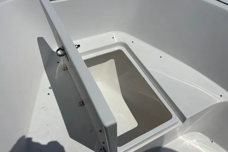 Slide: The Image of Open storage compartment on 2022 Cape Horn 22 OS boat, showcasing interior space. - 28