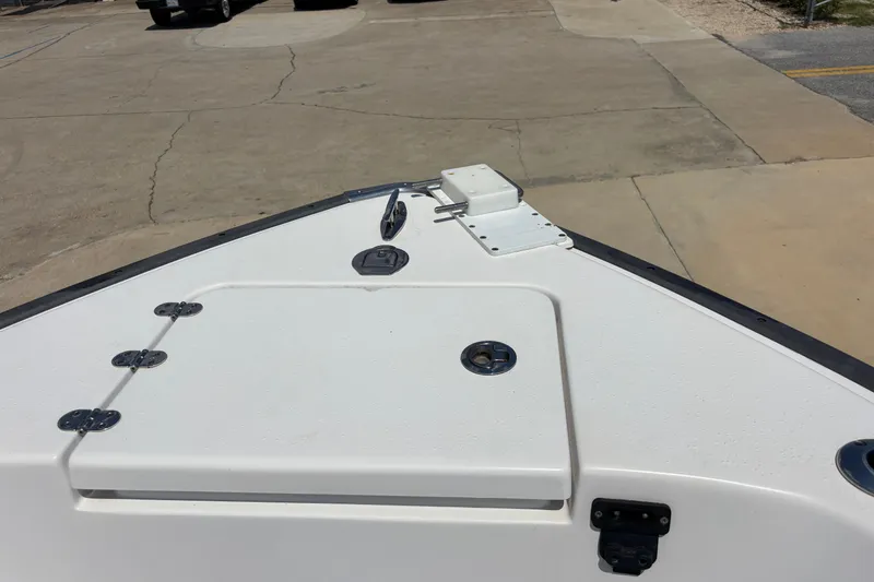 Slide: The Image of 2022 Cape Horn 22 OS boat deck with storage compartments and cleats. - 30