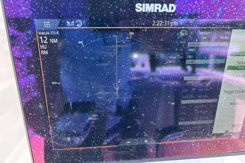 Slide: The Image of Simrad marine radar display on 2022 Cape Horn 22 OS boat, showing navigation data. - 49