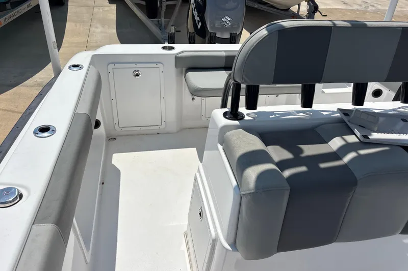 Slide: The Image of 2022 Cape Horn 22 OS boat interior with seating and storage compartments. - 52