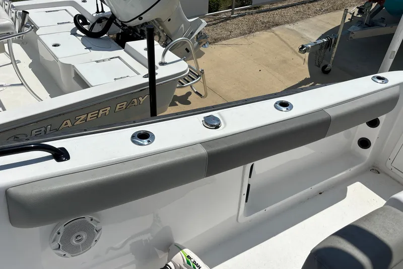 Slide: The Image of 2022 Cape Horn 22 OS boat interior with seating and rod holders. - 54