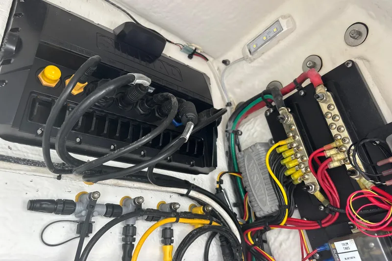 Slide: The Image of Electrical wiring and components inside a 2022 Cape Horn 22 OS boat. - 78