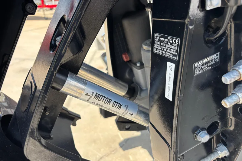 Slide: The Image of Close-up of a 2022 Cape Horn 22 OS boat motor with Suzuki components. - 9