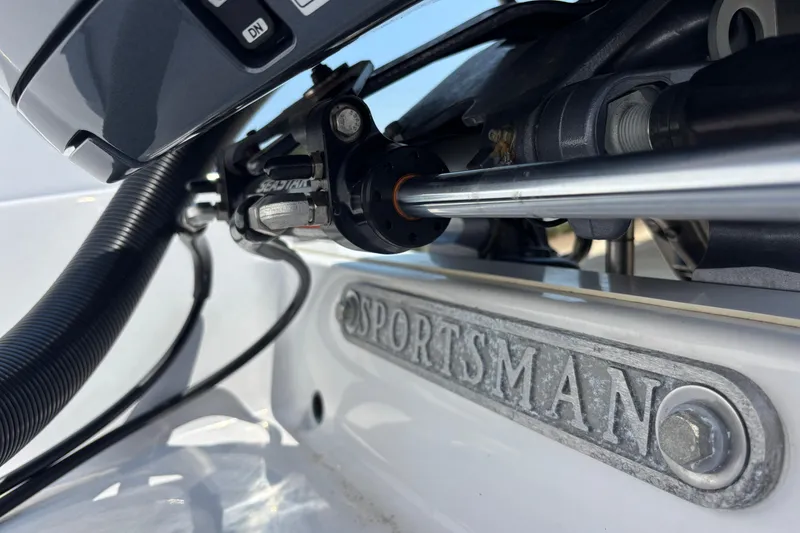 Slide: The Image of Close-up of 2022 Cape Horn 22 OS boat steering mechanism and Sportsman logo. - 19