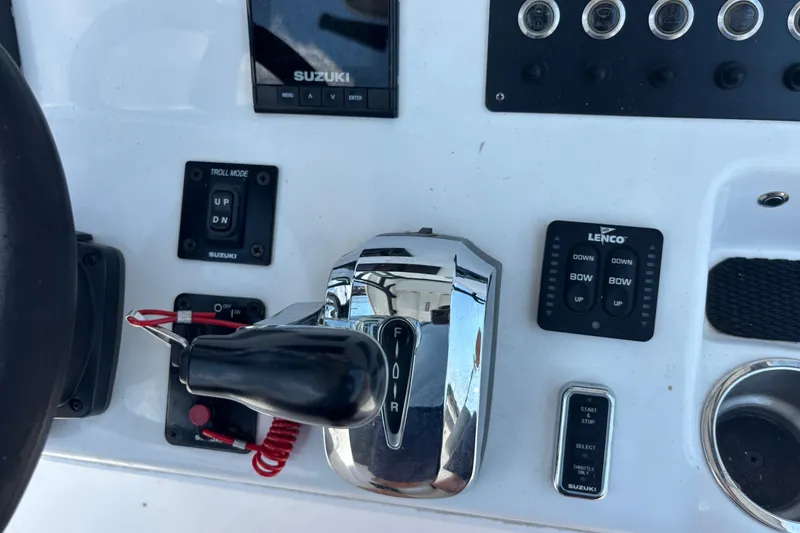 Slide: The Image of Control panel of a 2022 Cape Horn 22 OS boat with Suzuki and Lenco systems. - 25
