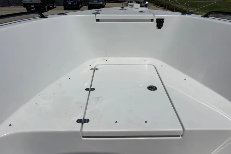 Slide: The Image of 2022 Cape Horn 22 OS boat deck with storage compartment, clean and spacious design. - 27