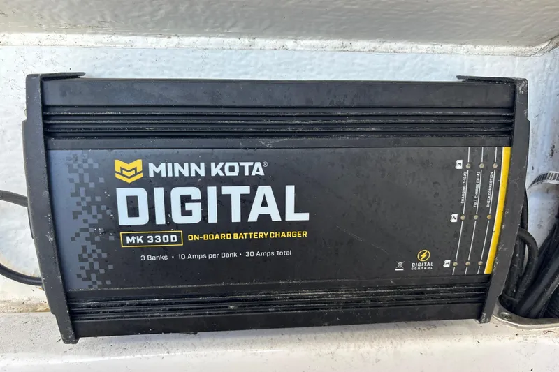 Slide: The Image of Minn Kota MK 330D digital on-board battery charger on a 2022 Cape Horn 22 OS. - 33