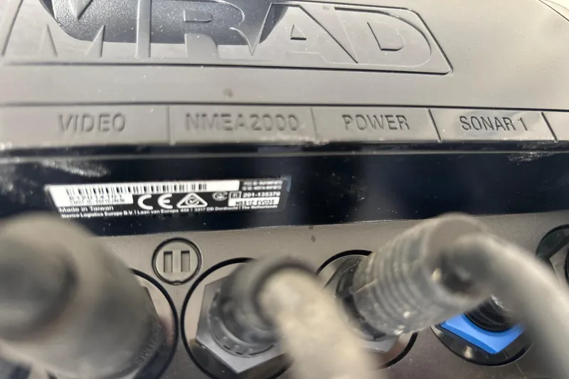 Slide: The Image of Close-up of marine electronic connections on a 2022 Cape Horn 22 OS boat. - 34