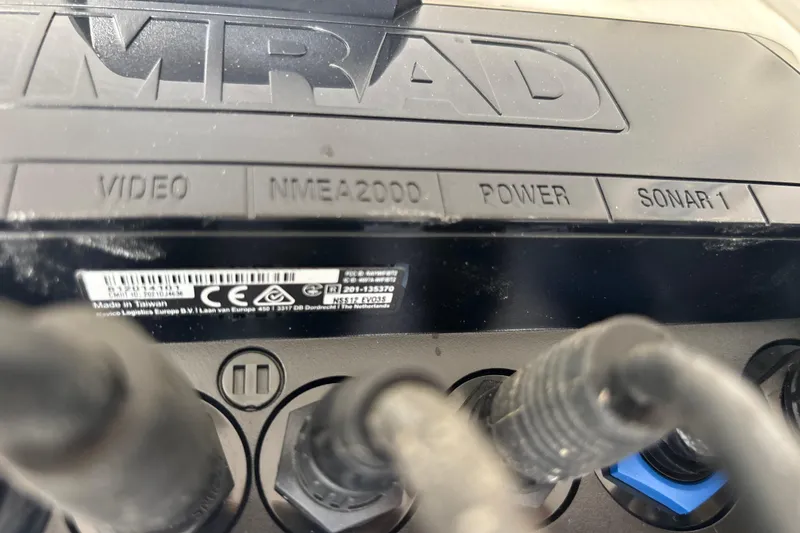 Slide: The Image of Control panel with video, power, and sonar ports on a 2022 Cape Horn 22 OS. - 35