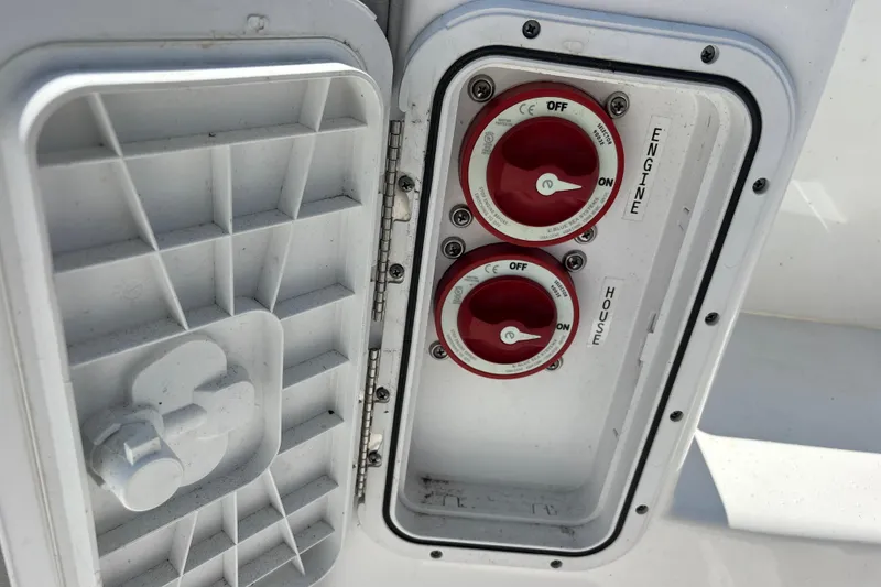 Slide: The Image of 2022 Cape Horn 22 OS boat battery switches for engine and house power. - 40