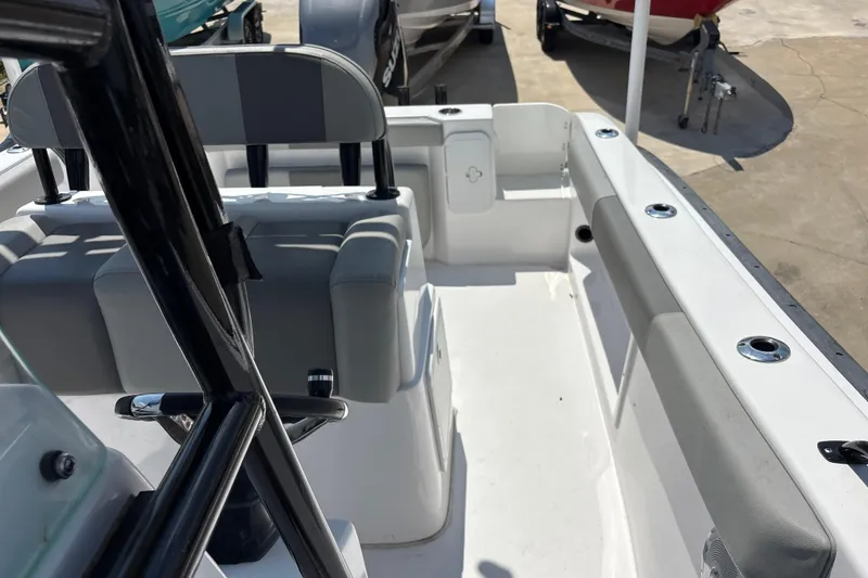 Slide: The Image of 2022 Cape Horn 22 OS boat interior with seating and rod holders. - 42