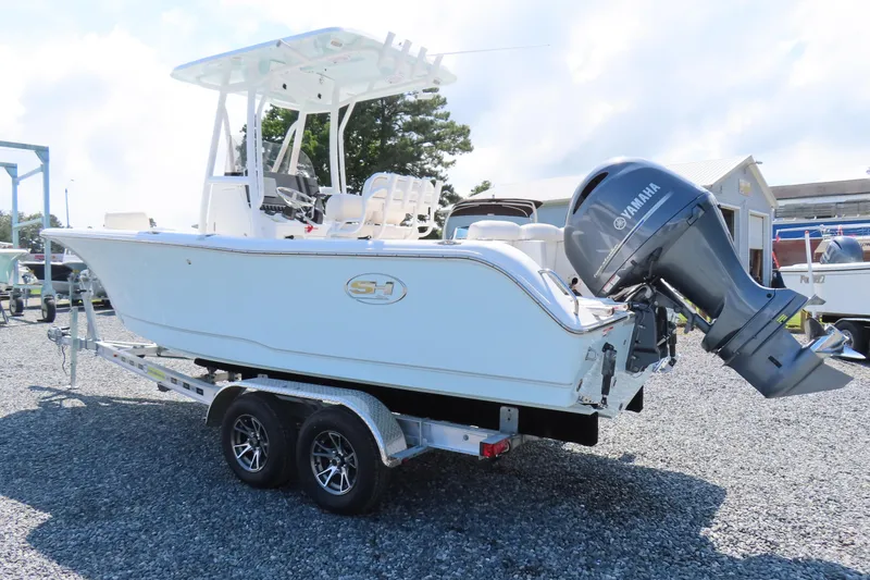 Slide: The Image of 2019 Sea Hunt Ultra 225 boat on trailer with Yamaha outboard motor. - 3