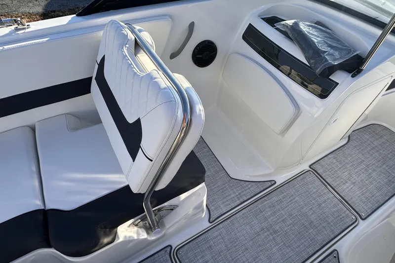 Slide: The Image of 2025 Bayliner VR5 Bowrider OB interior with white and black seating, modern design. - 11