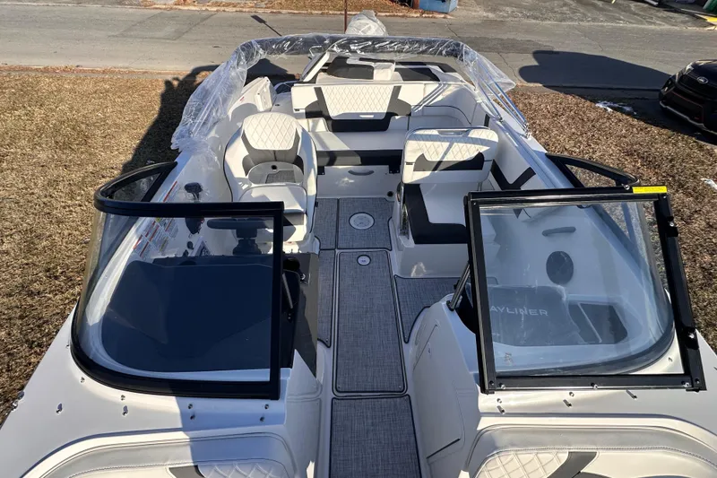 Slide: The Image of 2025 Bayliner VR5 Bowrider OB boat interior with open seating and modern design. - 17