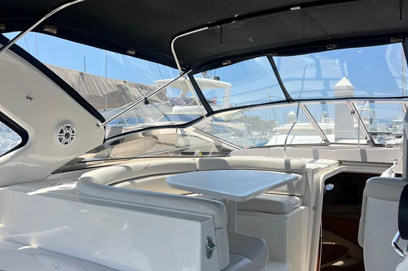 Slide: The Image of Luxurious interior of 2000 Regal Commodore 4160 yacht with sleek seating and table. - 6