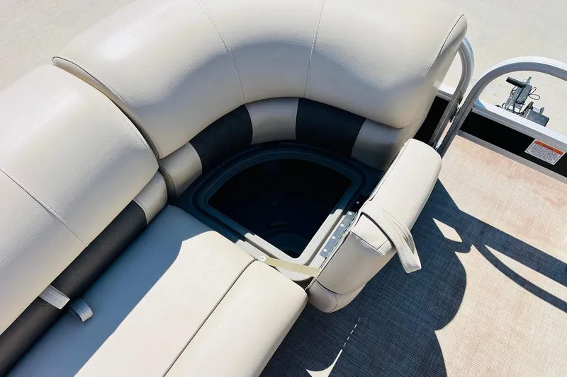 Slide: The Image of 2022 Sun Tracker SportFish 22 XP3 boat seating with storage compartment. - 15