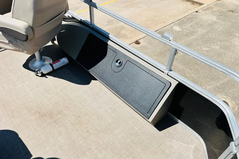 Slide: The Image of 2022 Sun Tracker SportFish 22 XP3 boat interior with seating and safety equipment. - 33