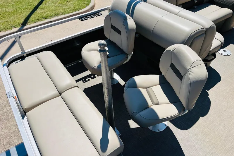 Slide: The Image of 2022 Sun Tracker SportFish 22 XP3 boat interior with comfortable seating arrangement. - 37
