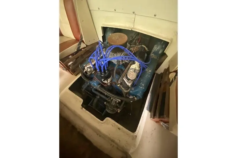 Slide: The Image of 1968 HILINER Sportsman engine with blue wires and chrome components. - 15