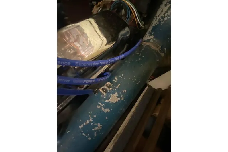 Slide: The Image of 1968 HILINER Sportsman engine detail with blue suppression spiral core wires. - 17