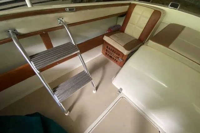 Slide: The Image of 1968 HILINER Sportsman boat interior with ladder and seating area. - 9