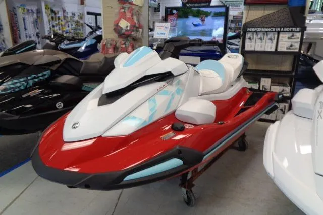 The Image of 2025 Yamaha WaveRunner VX Limited in showroom, featuring sleek red and white design. - 0