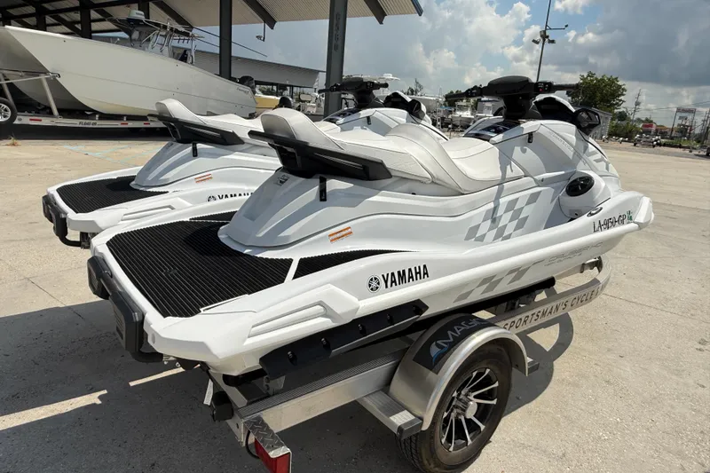 Slide: The Image of 2023 Yamaha WaveRunner VX Cruiser HO jet skis on a trailer, ready for adventure. - 7