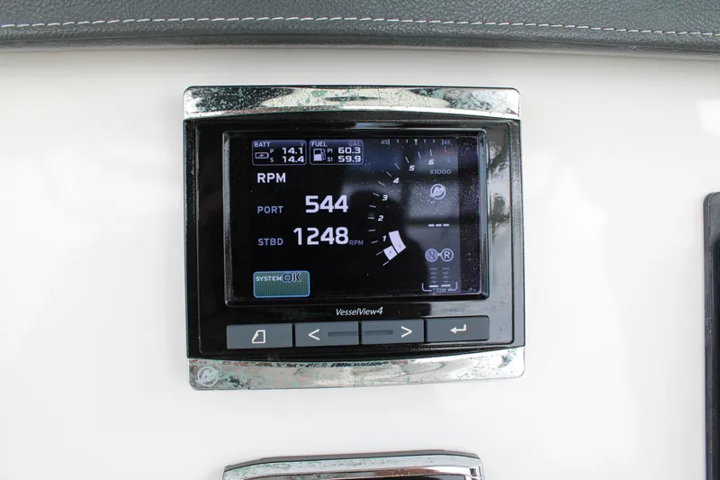 Slide: The Image of Digital display on 2015 Boston Whaler 320 Outrage showing RPM and system status. - 37