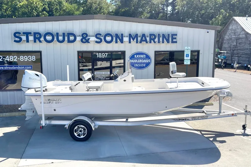 Slide: The Image of 2026 Carolina Skiff 21 LS boat on trailer at Stroud & Son Marine dealership. - 7