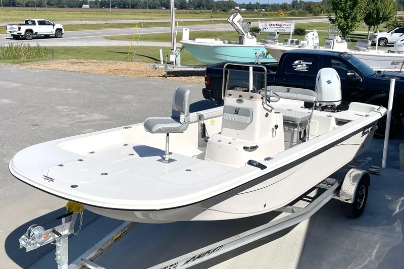 Slide: The Image of 2026 Carolina Skiff 21 LS boat on trailer in outdoor showroom. - 9