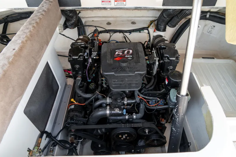 Slide: The Image of Engine compartment of a 2002 Sea Ray 230 Bow Rider with MerCruiser 5.0 MPI engine. - 27