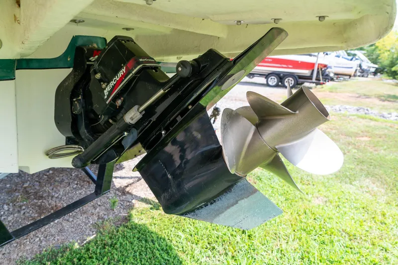 Slide: The Image of Close-up of a 2002 Sea Ray 230 Bow Rider boat propeller and Mercury engine. - 29