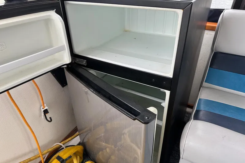 Slide: The Image of Open refrigerator in 1989 Sea Ray 380 Aft Cabin boat interior. - 10