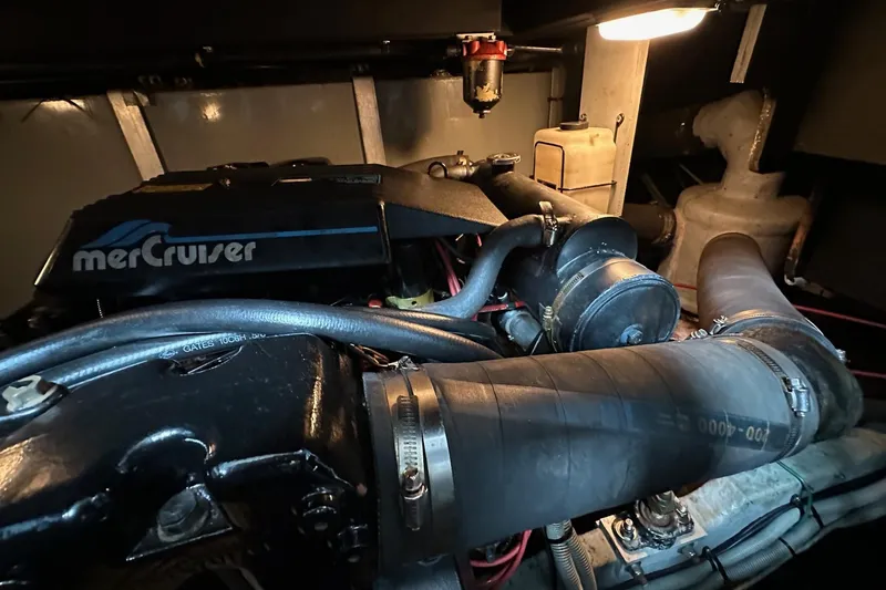 Slide: The Image of Engine room of 1989 Sea Ray 380 Aft Cabin with MerCruiser components. - 30