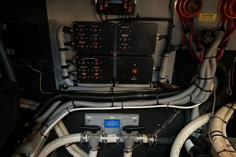 Slide: The Image of Electrical panel and wiring in a 1989 Sea Ray 380 Aft Cabin boat. - 33