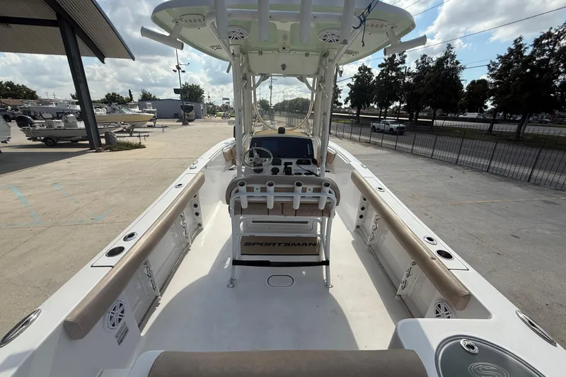 Slide: The Image of 2019 Sportsman 232 OE boat interior with helm, seating, and rod holders. - 8