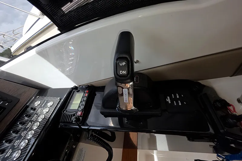 Slide: The Image of 2020 Cutwater C-24 boat control panel with throttle and navigation instruments. - 21