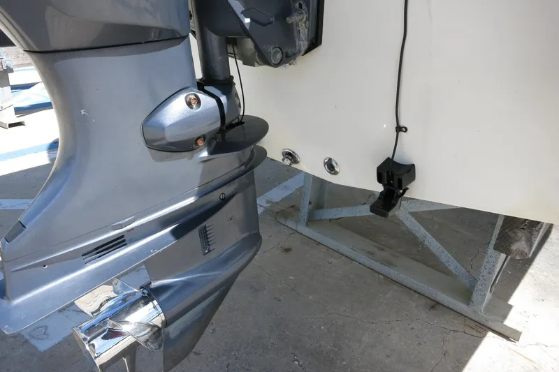 Slide: The Image of 2015 NauticStar 203SC Sport Deck boat engine and transom detail. - 15