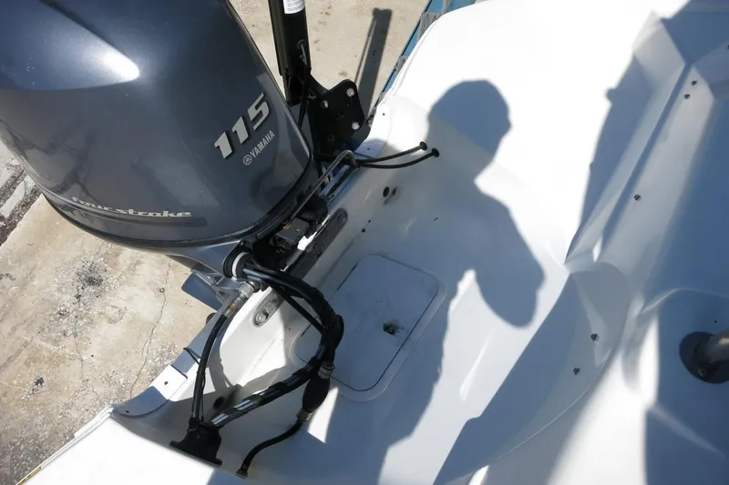 Slide: The Image of 2015 NauticStar 203SC Sport Deck with Yamaha 115 outboard motor. - 39