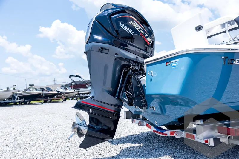 Slide: The Image of 2026 Tidewater 2110 Bay Max boat with Yamaha outboard motor on a trailer. - 18