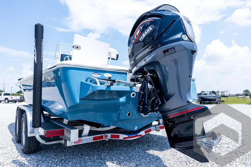 Slide: The Image of 2026 Tidewater 2110 Bay Max boat with Yamaha outboard engine on a trailer. - 22