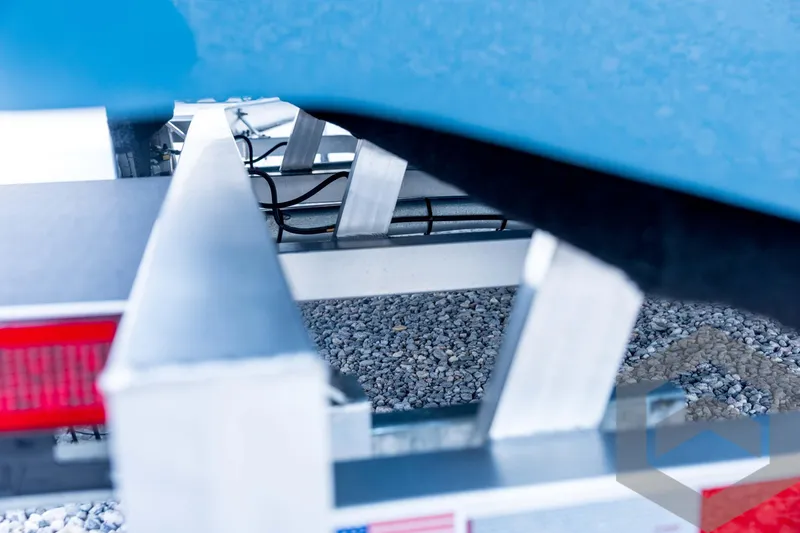 Slide: The Image of Close-up of 2026 Tidewater 2110 Bay Max boat trailer on gravel surface. - 31