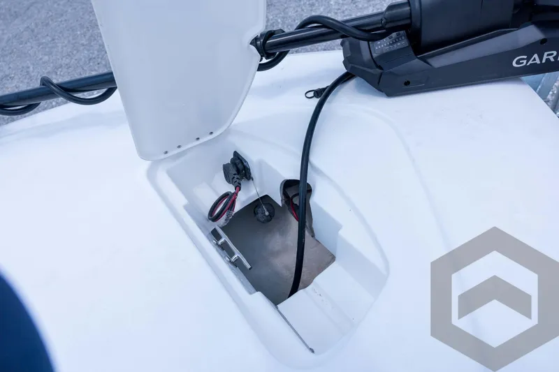 Slide: The Image of 2026 Tidewater 2110 Bay Max boat wiring compartment with cables and connectors. - 45