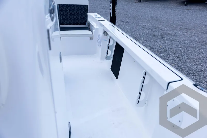 Slide: The Image of 2026 Tidewater 2110 Bay Max boat interior with seating and storage compartments. - 55
