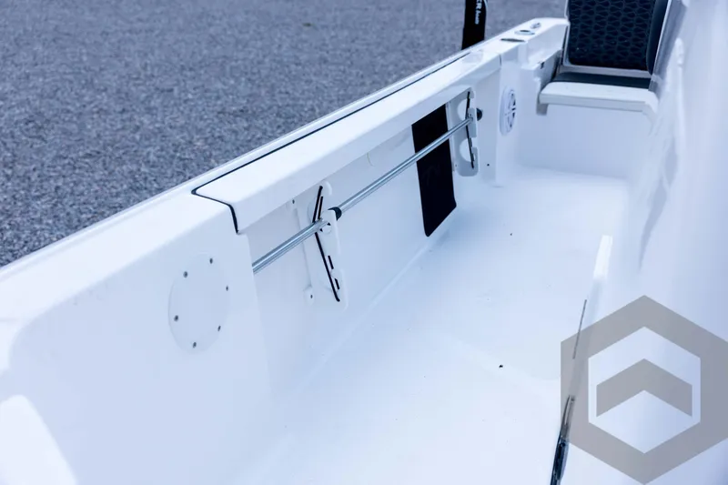 Slide: The Image of 2026 Tidewater 2110 Bay Max boat interior, showcasing sleek white design and seating. - 56