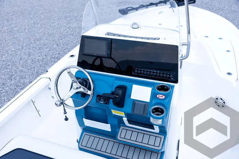 Slide: The Image of 2026 Tidewater 2110 Bay Max boat console with steering wheel and navigation display. - 62