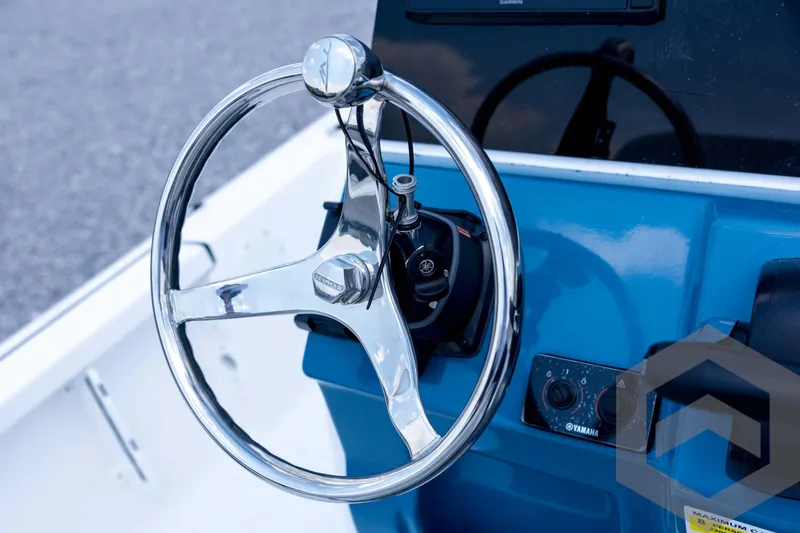 Slide: The Image of 2026 Tidewater 2110 Bay Max boat steering wheel and dashboard close-up. - 67