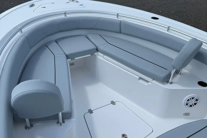 Slide: The Image of 2026 Sportsman Open 232 Center Console boat with spacious seating area. - 5