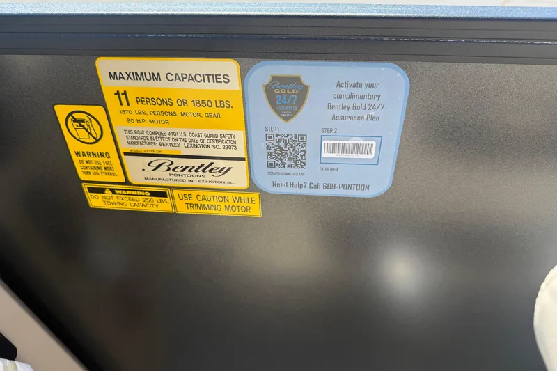 Slide: The Image of 2026 Bentley Pontoons LE 200 CW interior with beige seating and sleek design. - 12