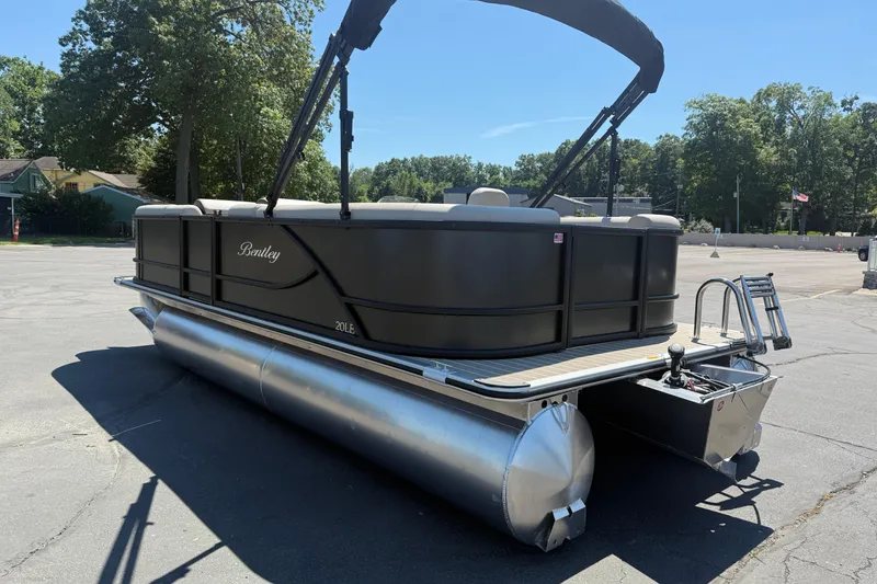 Slide: The Image of 2026 Bentley Pontoons LE 200 CW pontoon boat parked outdoors on a sunny day. - 5
